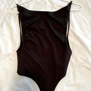 backless black bodysuit